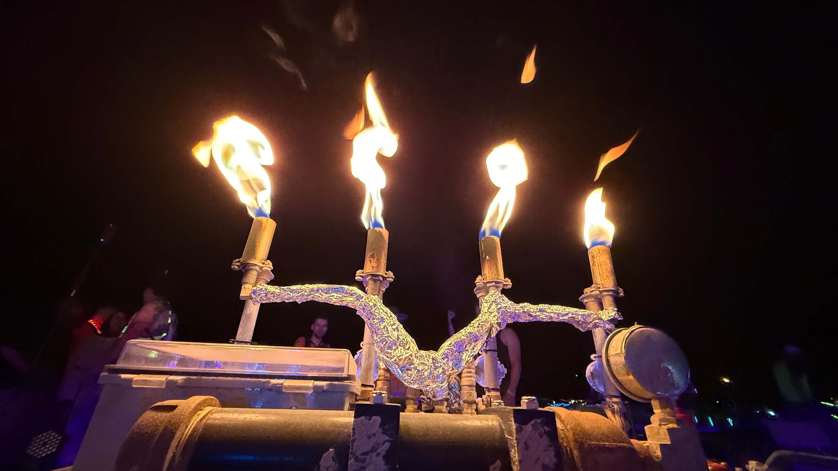 Team celebrating after successful Mini Nova completion, showing collective achievement